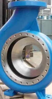 A blue valve mounted on a stand positioned in front of a machine, ready for precise control and regulation.